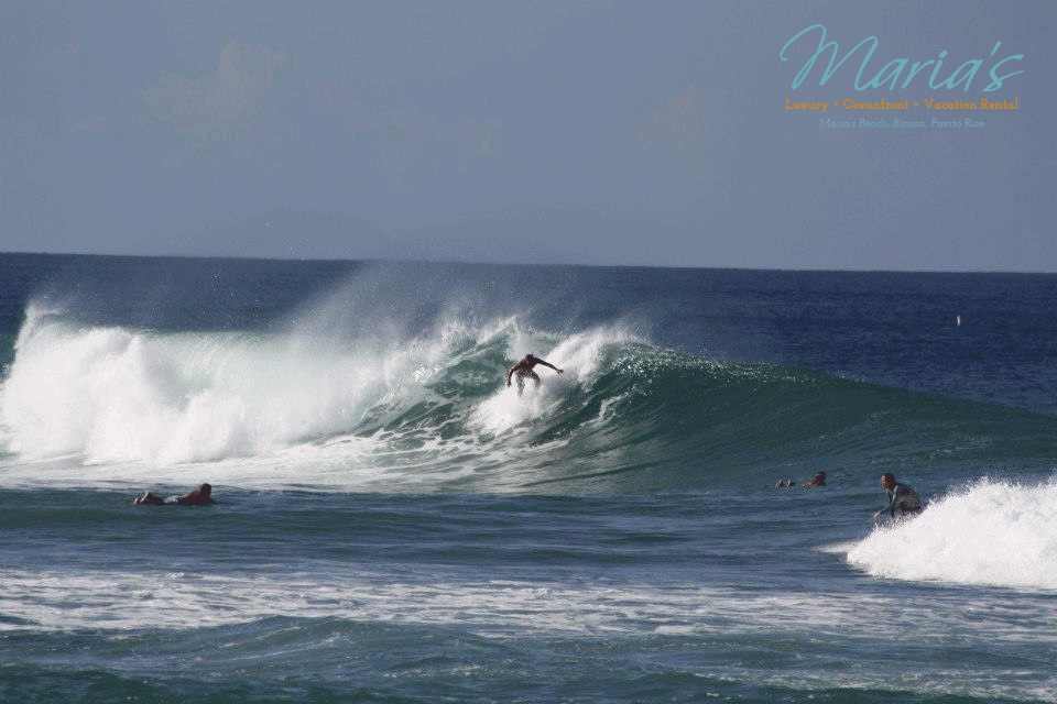 Surfer riding the wave at Maria's break